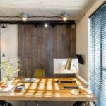 Industrial-style dining area with a wooden table