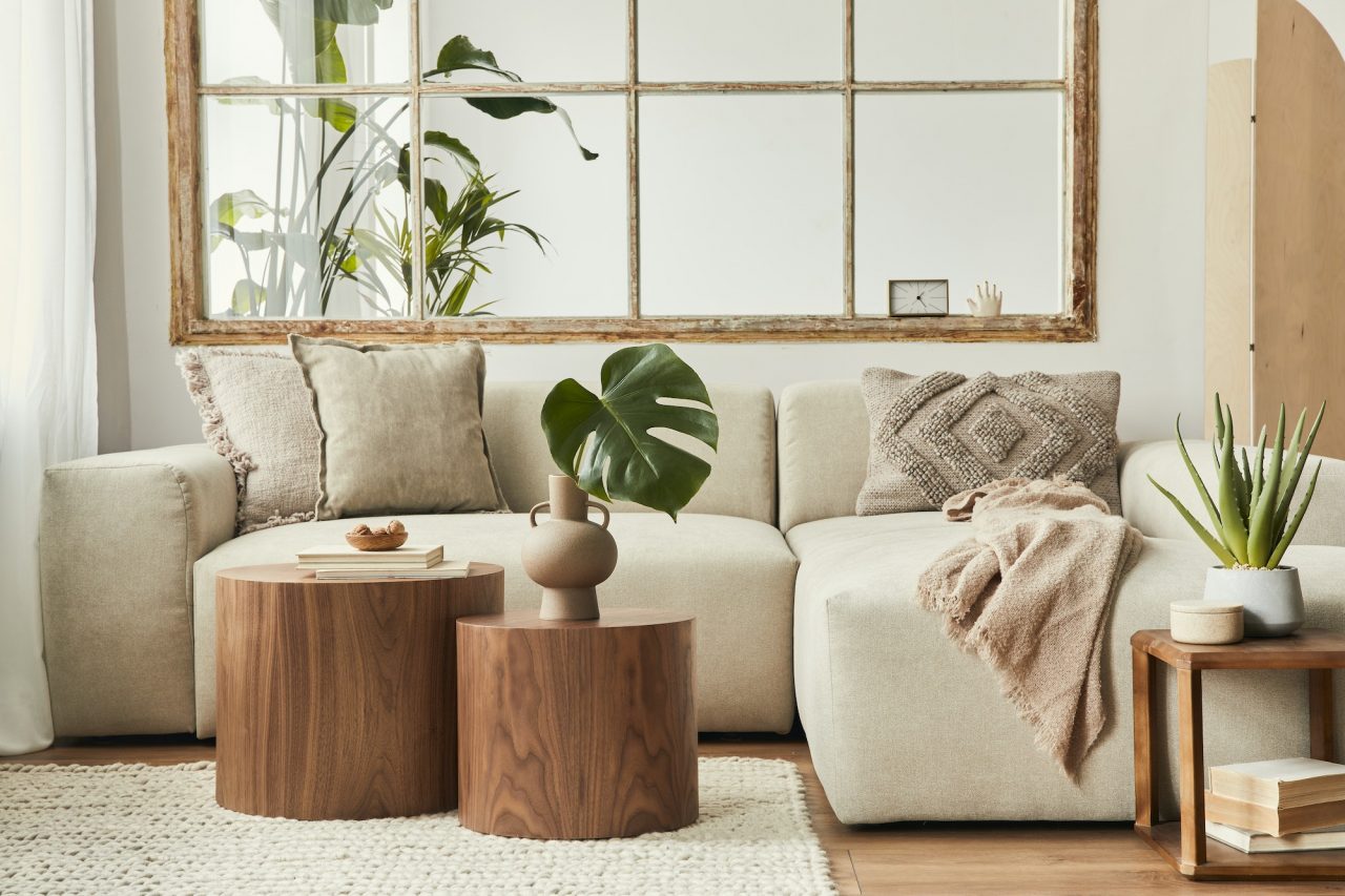 Cream sofa with wooden side tables