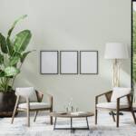 Pair of wooden armchairs with a round coffee table